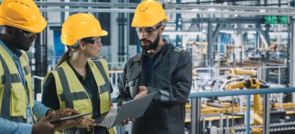 Engineers consulting on pre-automation process