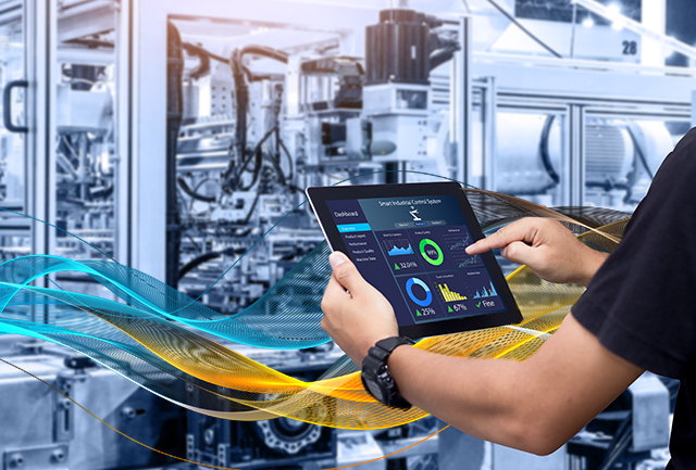 Automation Lifecycle image showing person on tablet in front of automation equipment
