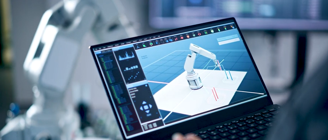 Digital Twin on computer screen in front of robot