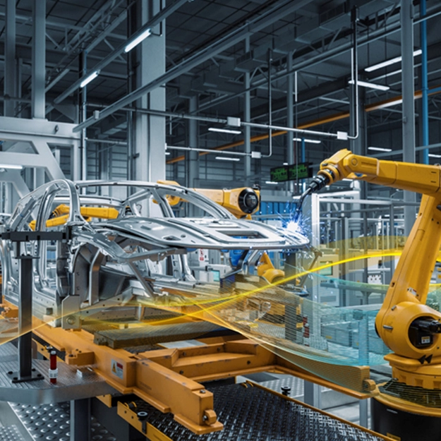 Factory Automation Capabilities showing robotic arm working on a vehicle