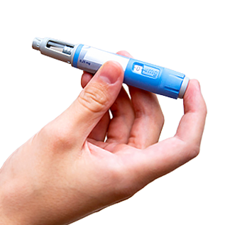 Injection device in someone's hand