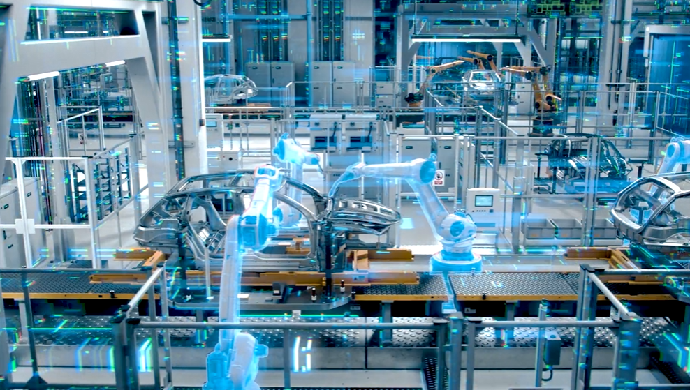 Factory assembly line showing vehicles and robotic arms